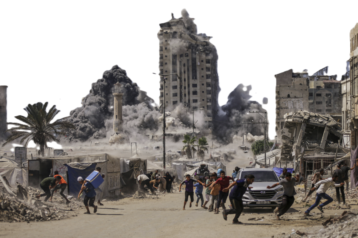  FILE - Palestinians run for cover during an Israeli airstrike on a high-rise building in Gaza City, Friday, Sept. 5, 2025, after the Israeli army issued a warning. (AP Photo/Yousef Al Zanoun, File) 