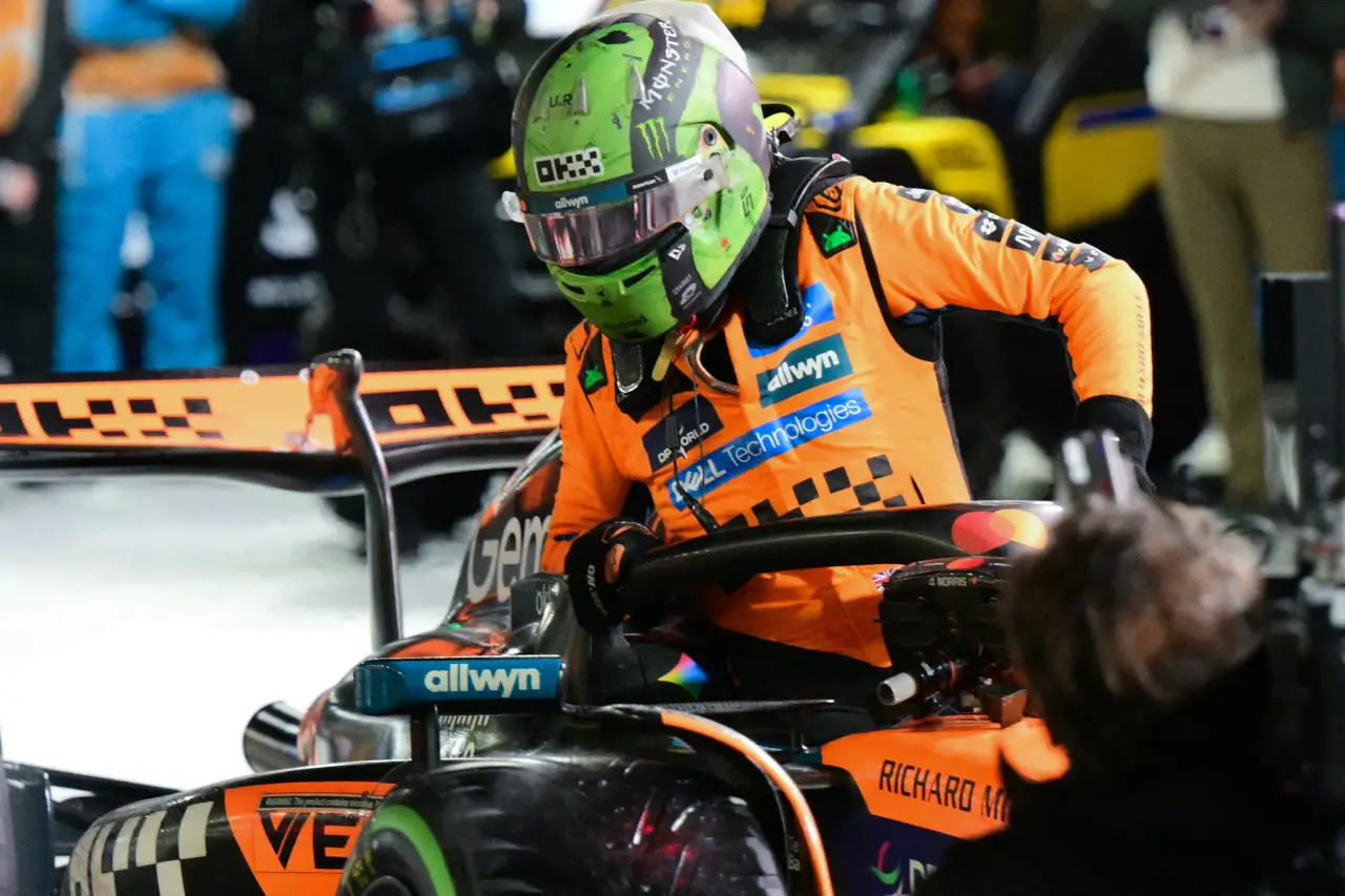 McLaren's British driver Lando Norris exits his car after winning the pole position during the qualifying session for the Las Vegas Formula One Grand Prix at the Las Vegas Strip Circuit in Las Vegas, Nevada, on November 21, 2025. (Photo by Frederic J. Bro