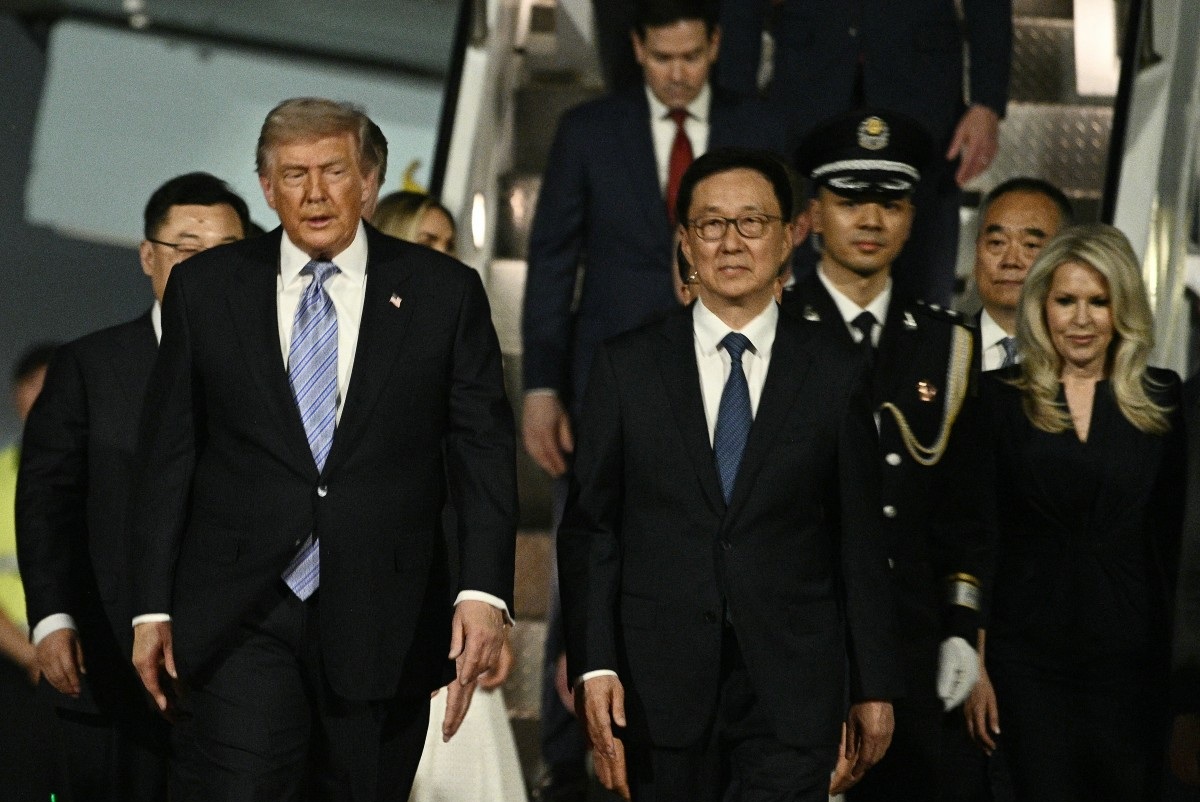 US President Trump arrives in China for superpower summit with his Chinese counterpart 
