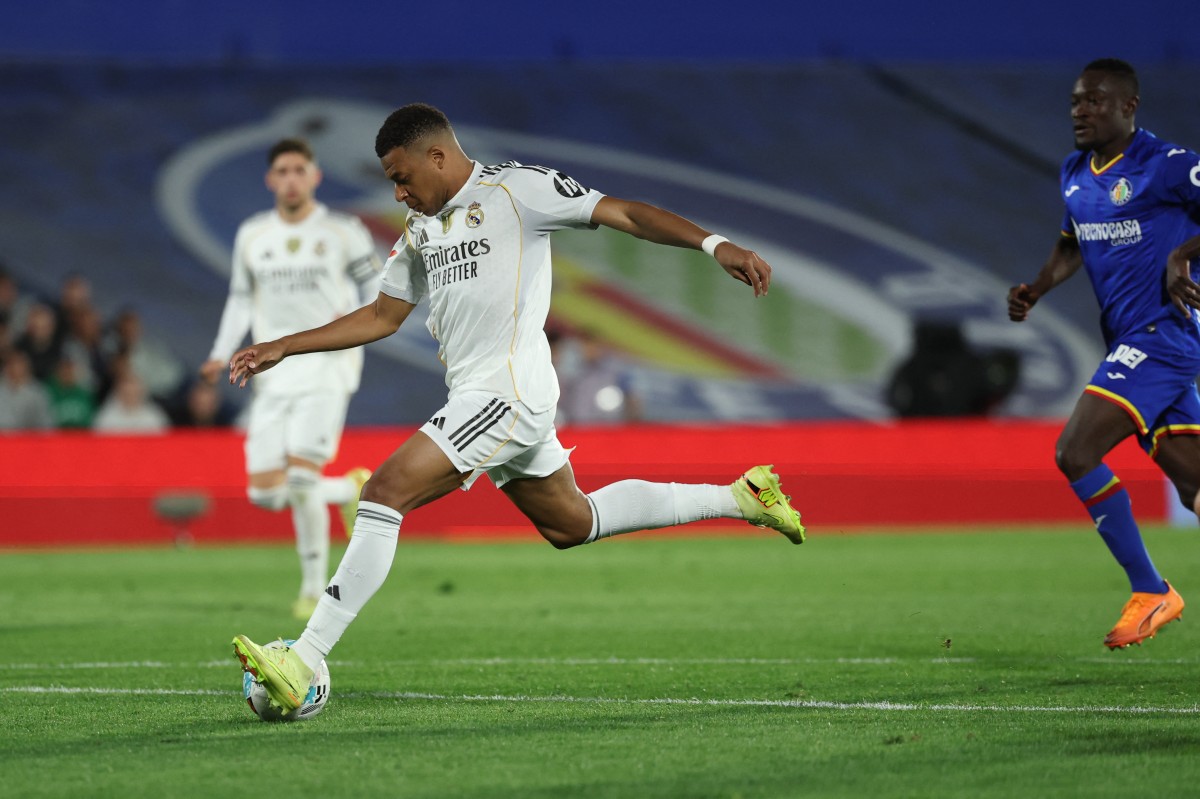 Mbappe sends Real Madrid top as Getafe self-destruct