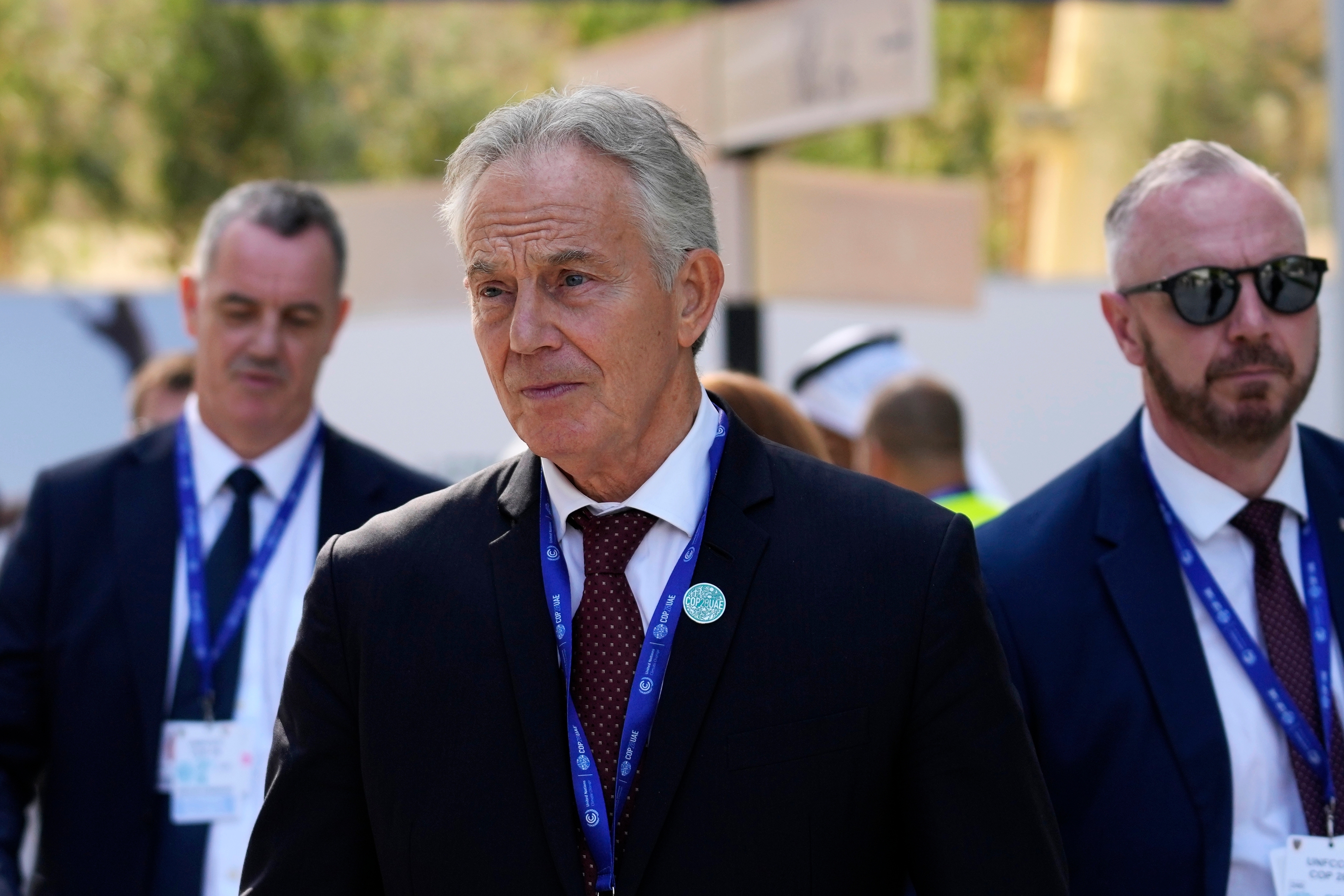 Britain's former Prime Minister Tony Blair walks through the COP28 U.N. Climate Summit, Sunday, Dec. 3, 2023