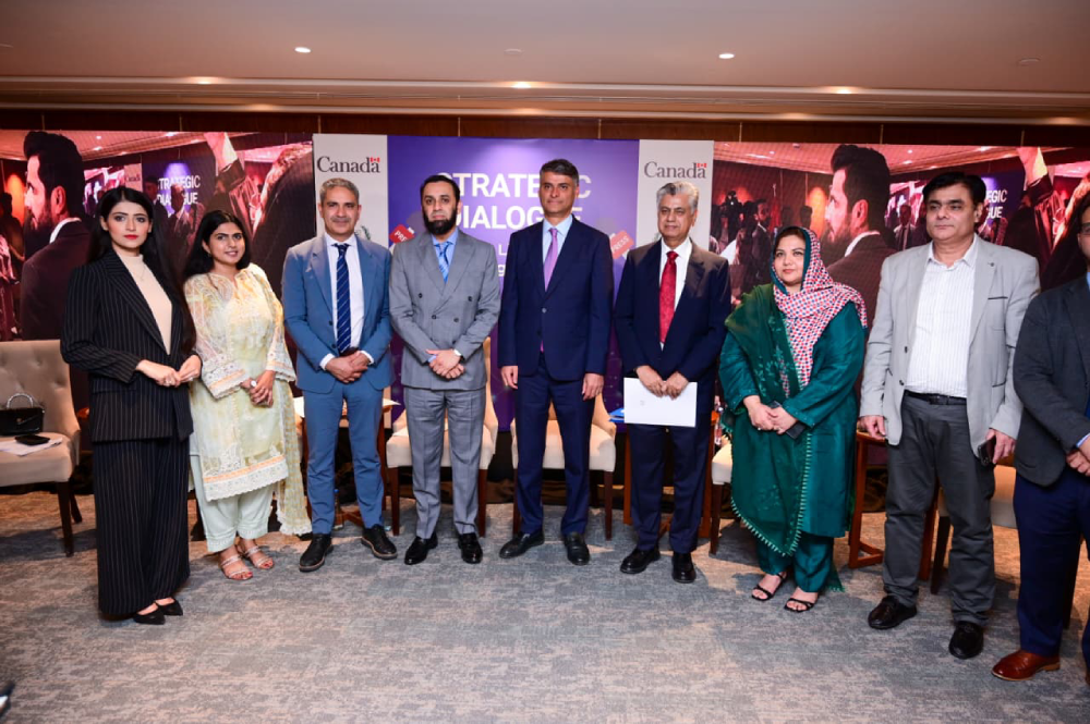 A group photo of participants of the strategic dialogue on media literacy with Minister for Information and Broadcasting Attaullah Tarar, taken on October 22, 2025, in Islamabad.