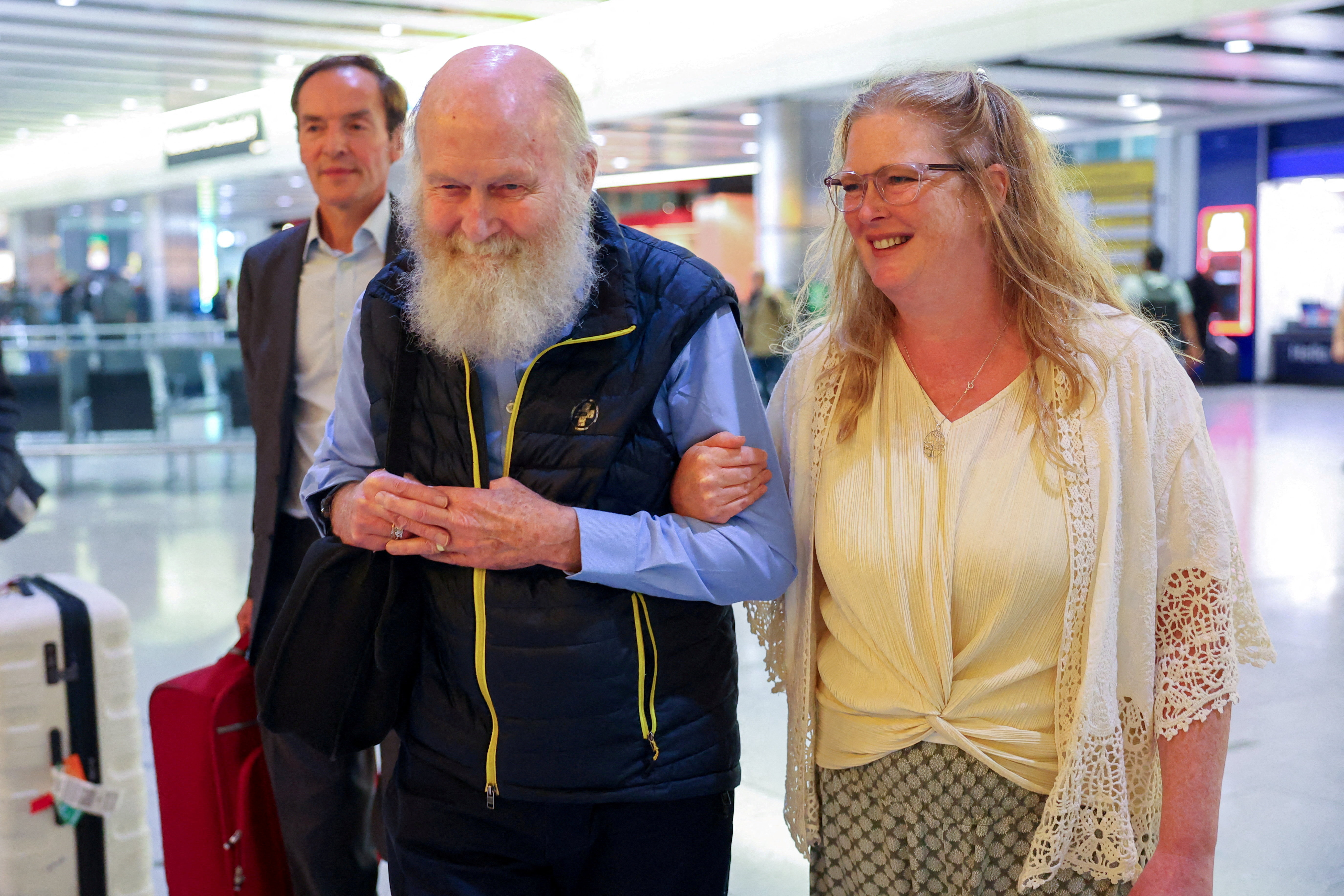 British couple released from detention by Taliban arrive back in London