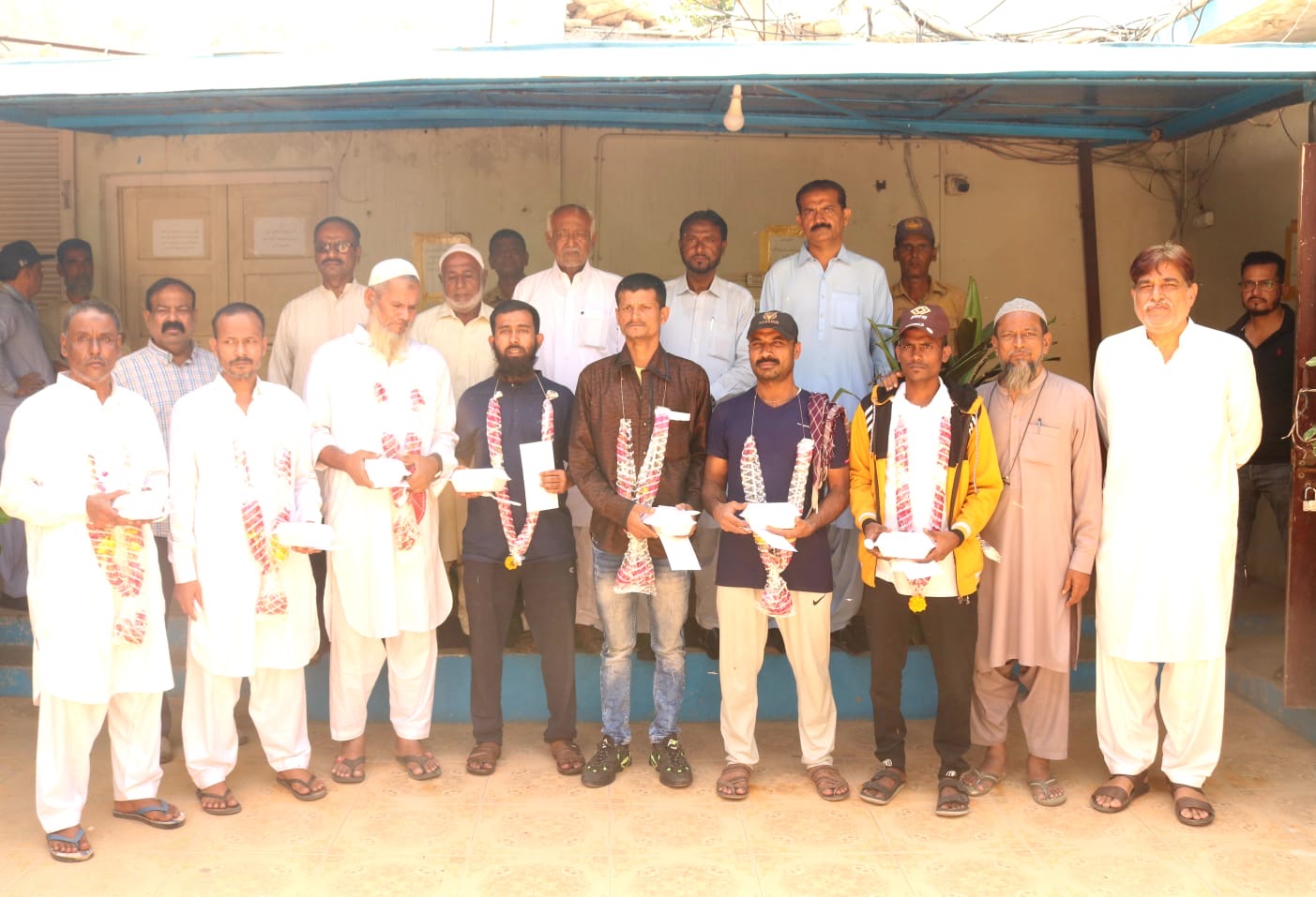 Freed Pakistani fishermen given a warm welcome upon returning to their country.