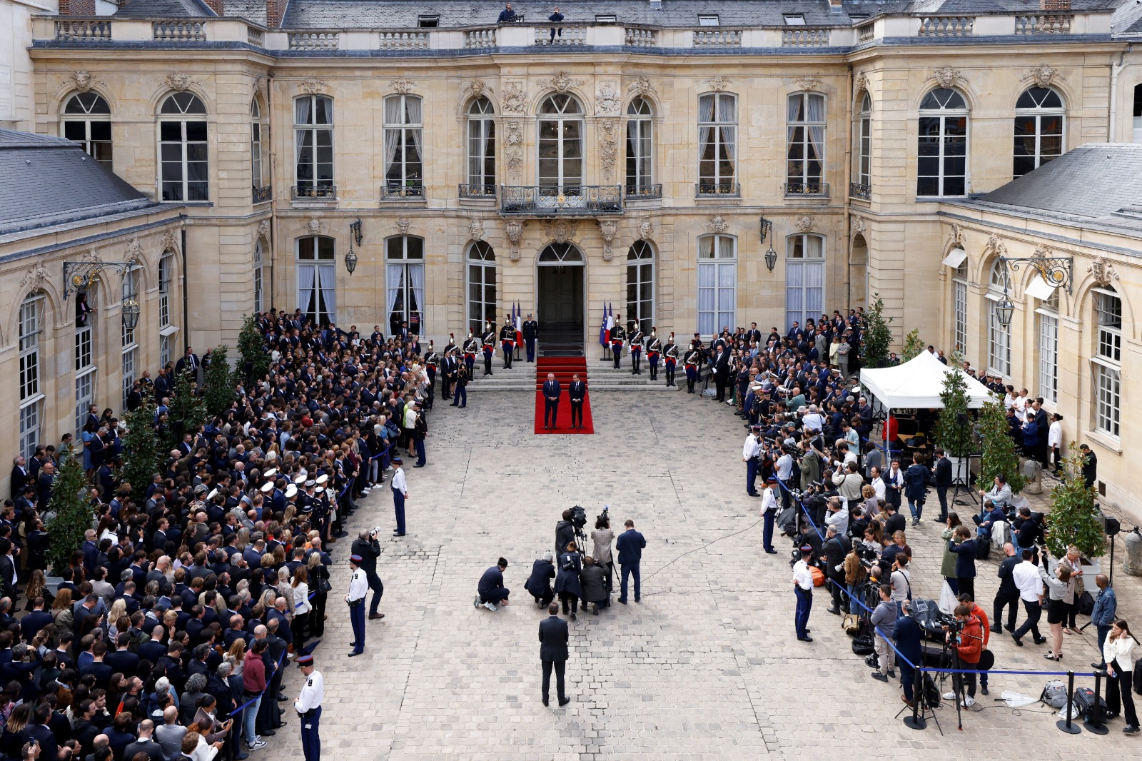 France's new prime minister takes office amid anti-government protests