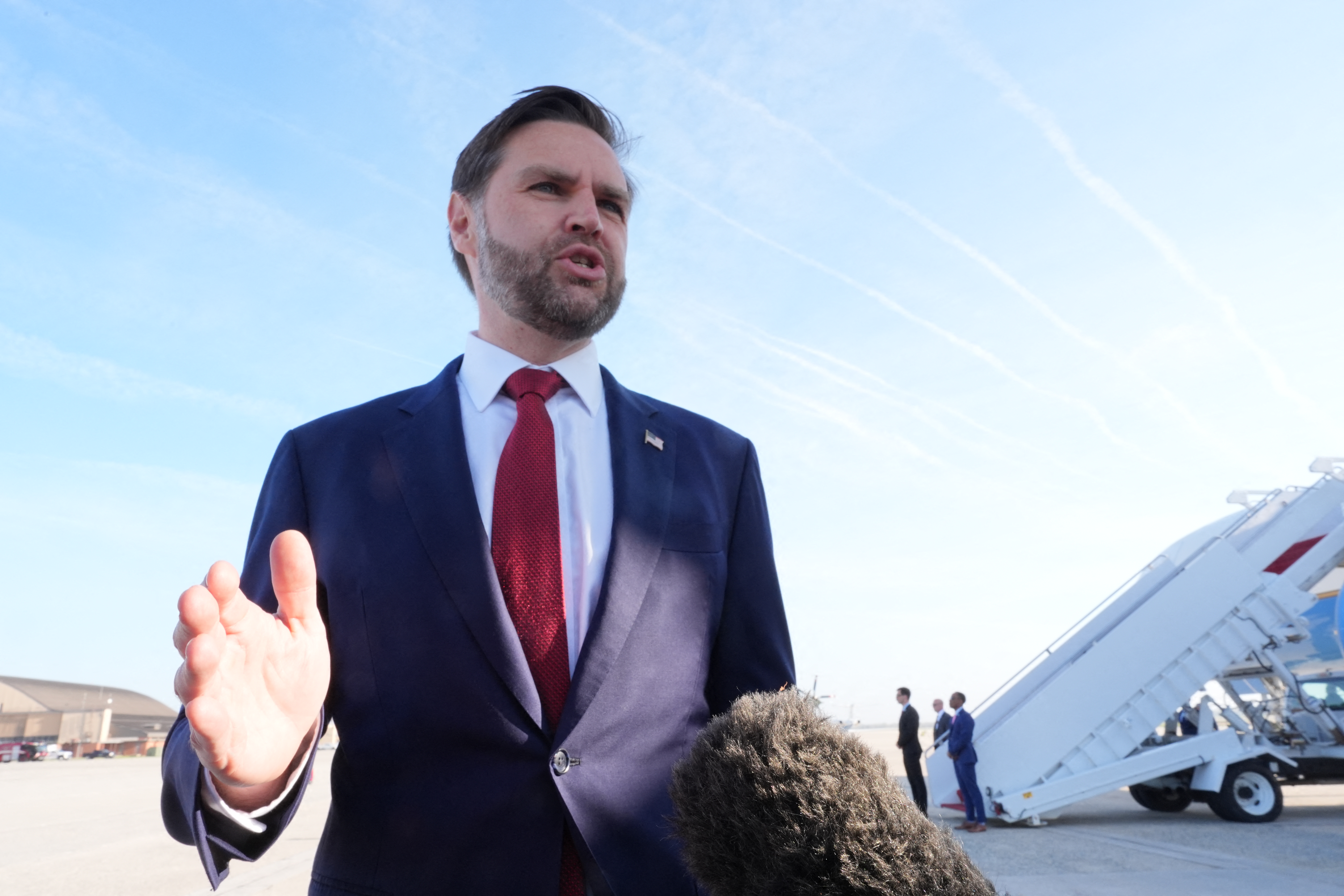 US Vice President JD Vance speaks to reporters before boarding Air Force Two at Joint Base Andrews, Maryland, on April 10, 2026, as he departs for Pakistan for talks on Iran. (AFP)