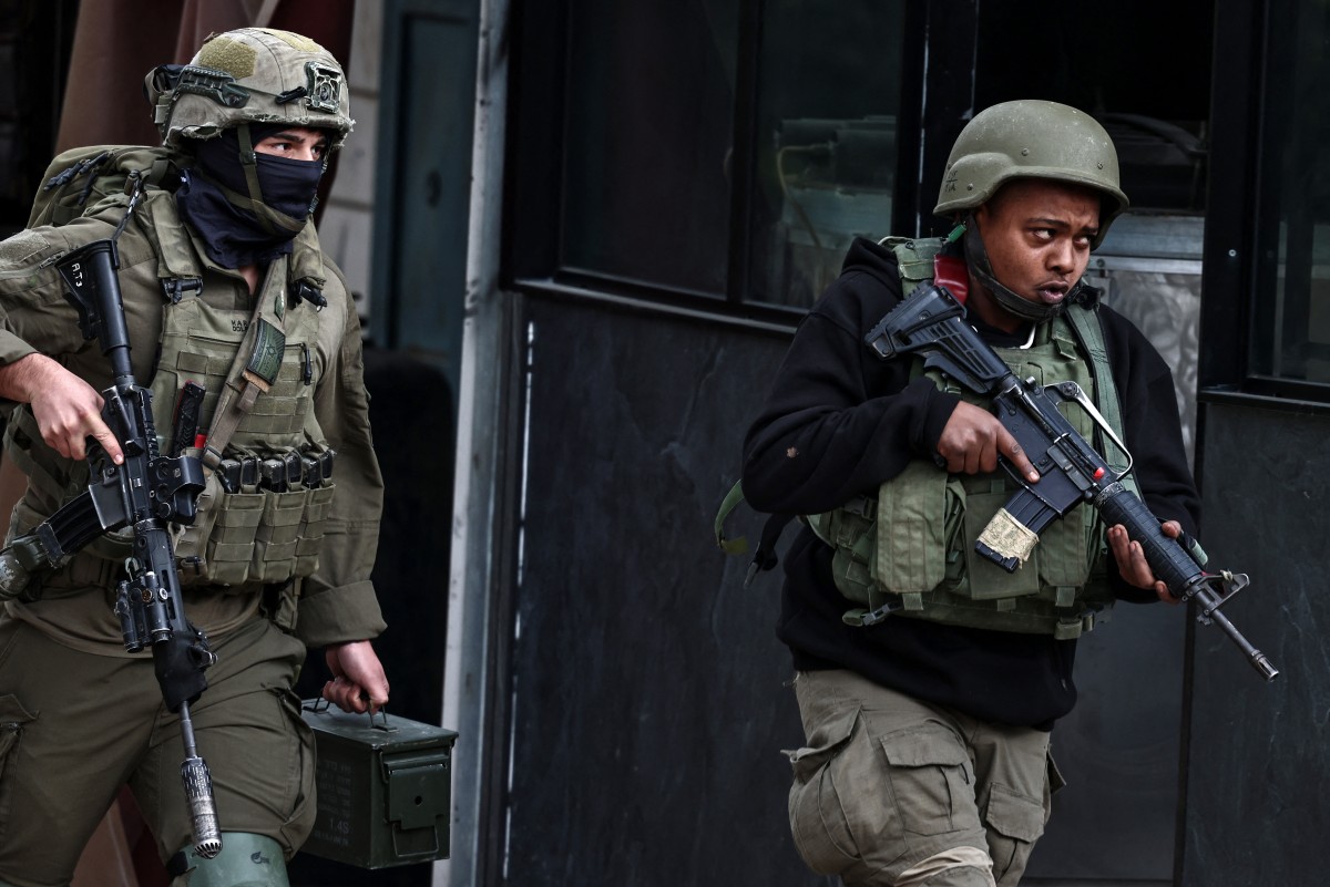 Israel seals off Palestinian village after deadly attack