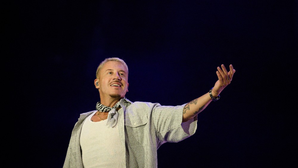 Macklemore’s pro-Palestinian remarks at Ed Sheeran concert draw calls for removal