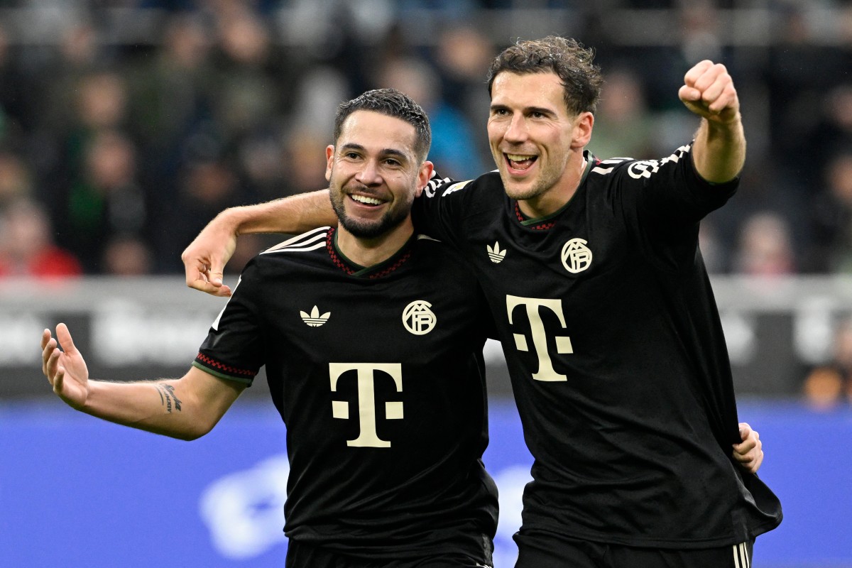 Bayern beat 10-man Gladbach to match European record