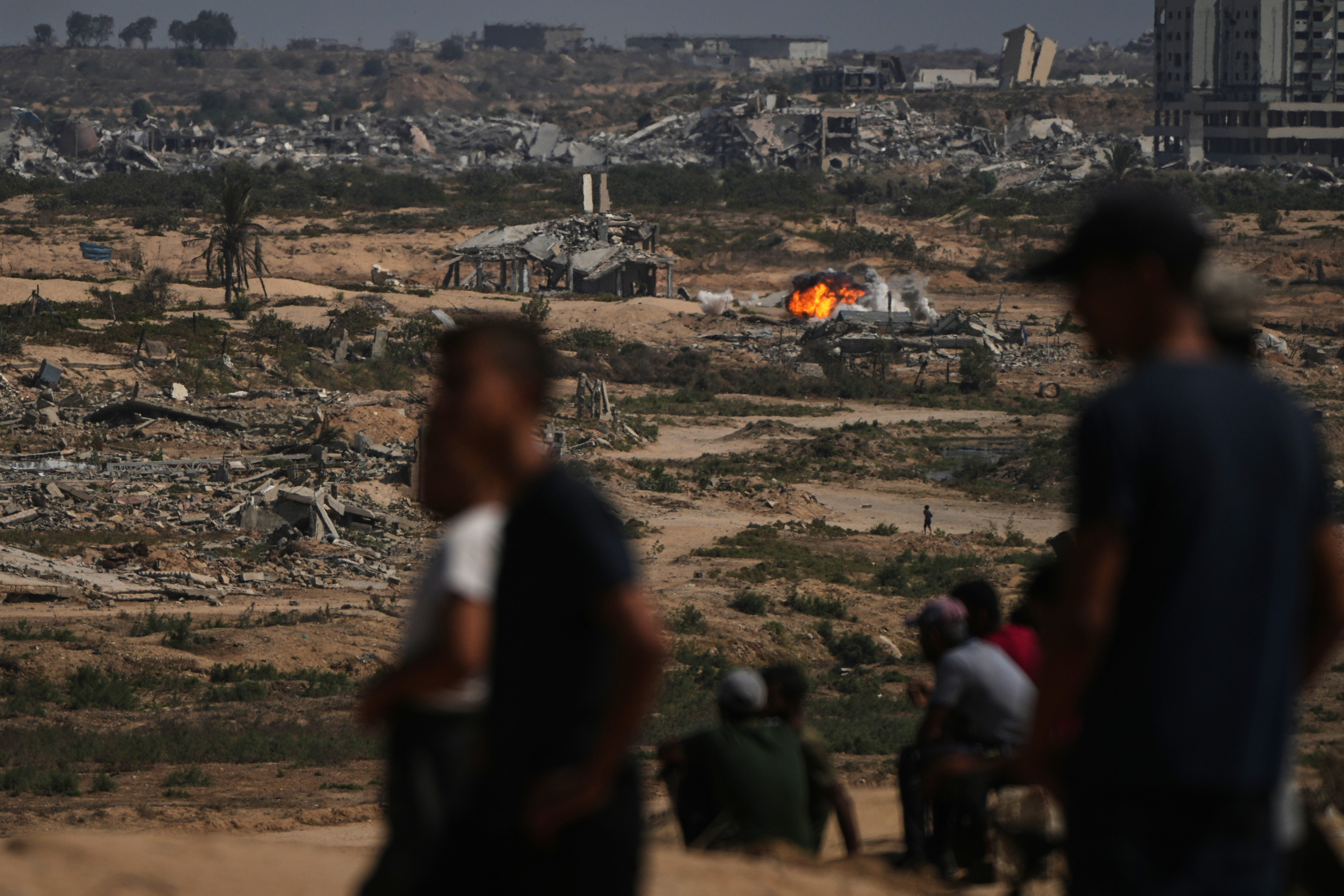 Fire and smoke rises following an Israeli army shelling in Nuseirat, central Gaza Strip, Saturday, Oct. 4, 2025.