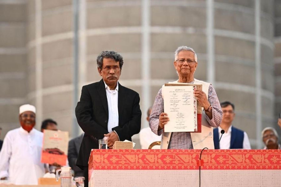Representatives of political parties signed the July National Charter at the South Plaza of the National Parliament in the presence of Professor Muhammad Yunus, the chief advisor to the interim government and head of the National Consensus Commission. (Ph