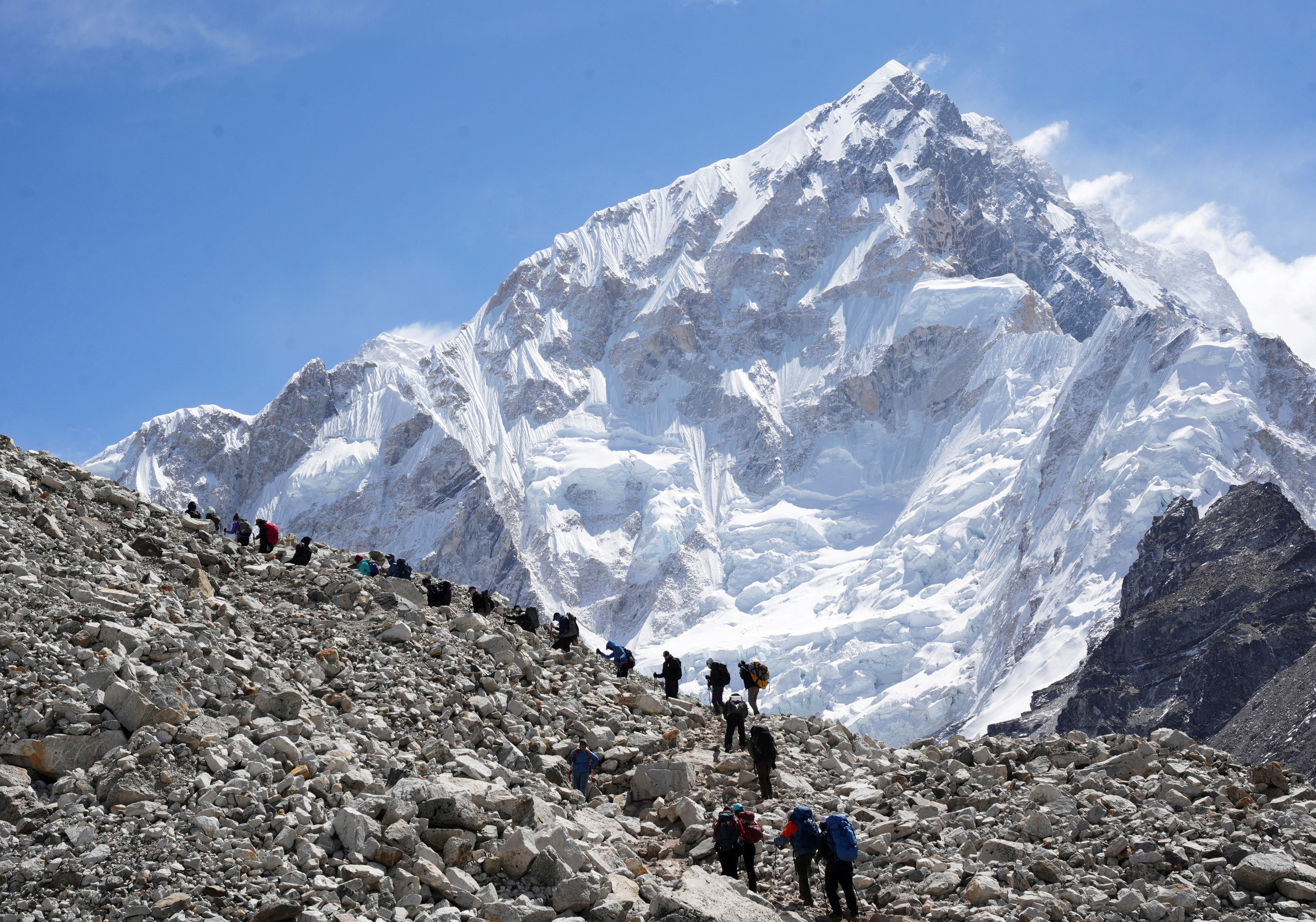  Mountaineers and trekkers head towards the Everest base camp from Lobuche in the Solukhumbu district, also known as the Everest region, Nepal April 12, 2025. (Reuters)