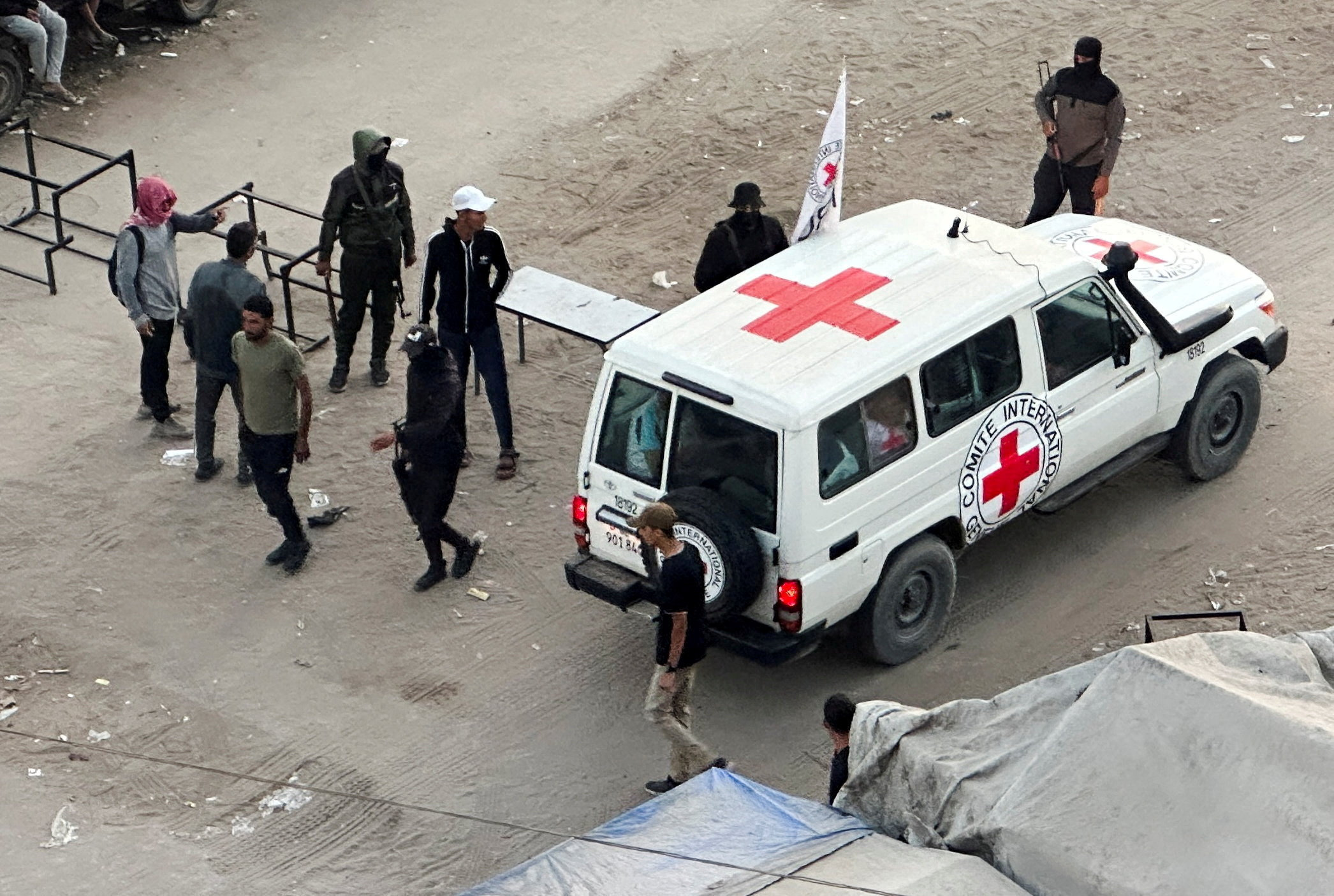 Hamas hands over first 7 hostages to Red Cross as part of Gaza ceasefire, Israeli army
