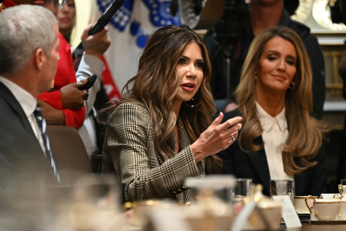 US Secretary of Homeland Security Kristi Noem (C) speaks during a Cabinet meeting in the Cabinet Room of the White House in Washington, DC, on December 2, 2025. (Photo by Andrew Caballero-Reynolds / AFP)