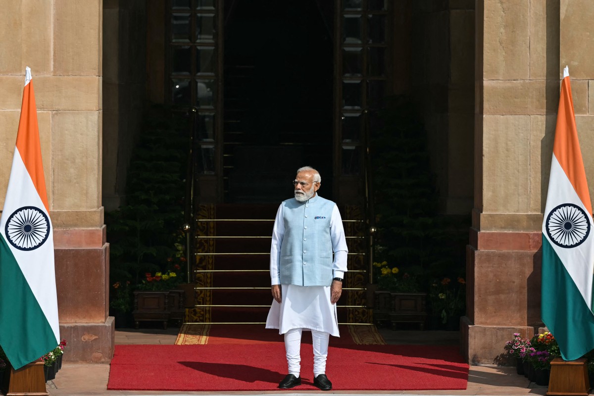 India's Prime Minister Narendra Modi waits for the arrival of Brazil's President Luiz Inacio Lula da Silva at the Hyderabad House in New Delhi on February 21, 2026