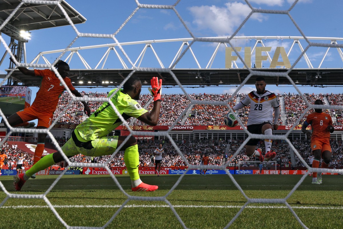 Germany come from behind to beat Ivory Coast and reach World Cup last 32