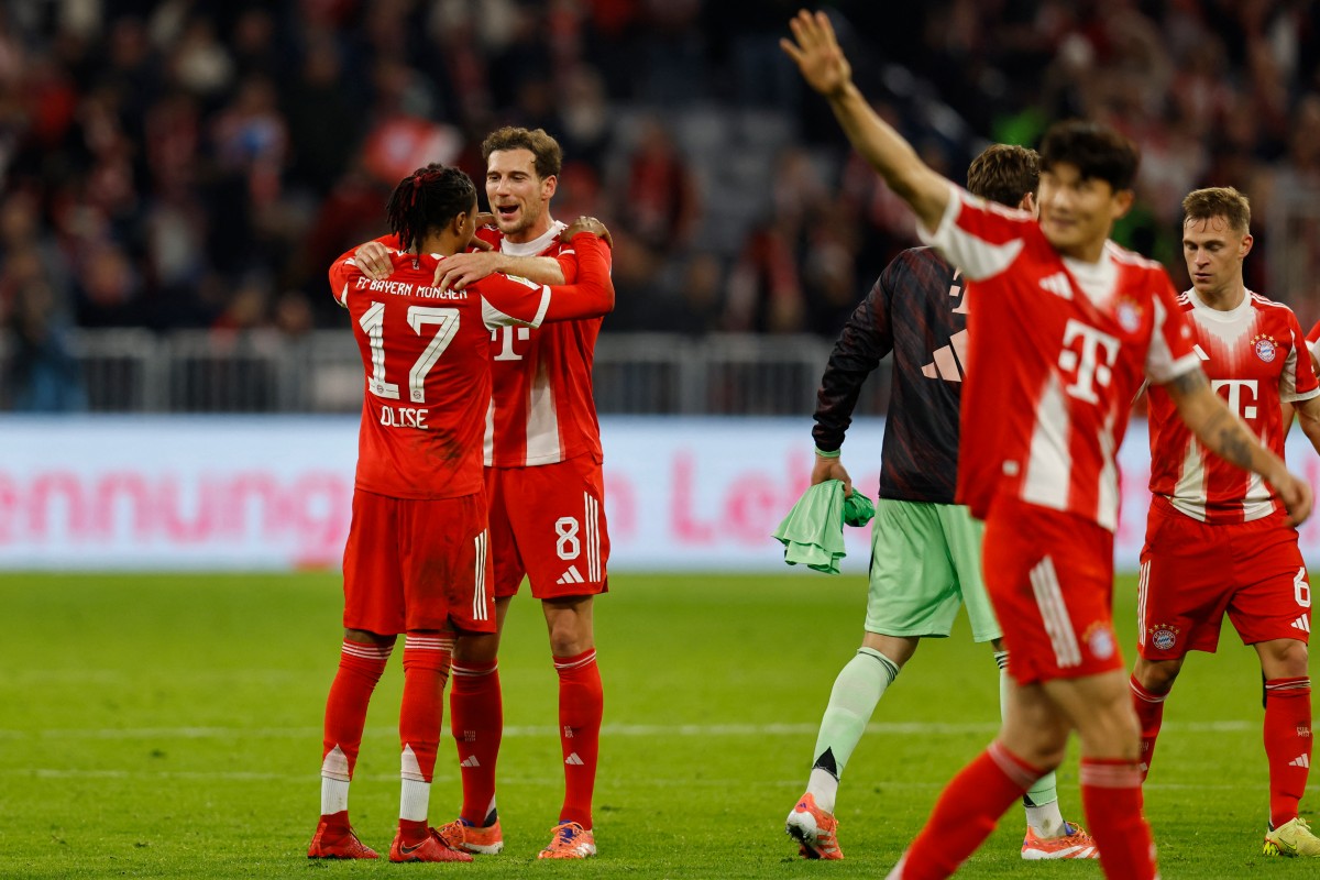 Kane strikes again as Bayern beat Dortmund to stay clear in Bundesliga