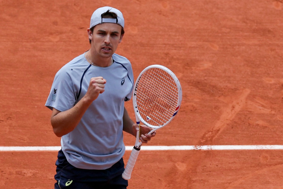 Flavio Cobolli fights into French Open last eight against dogged Zachary Svajda