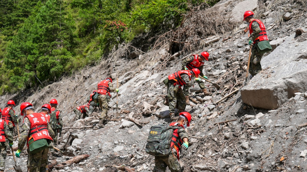 Number of missing in Nepal, China floods nears 3000