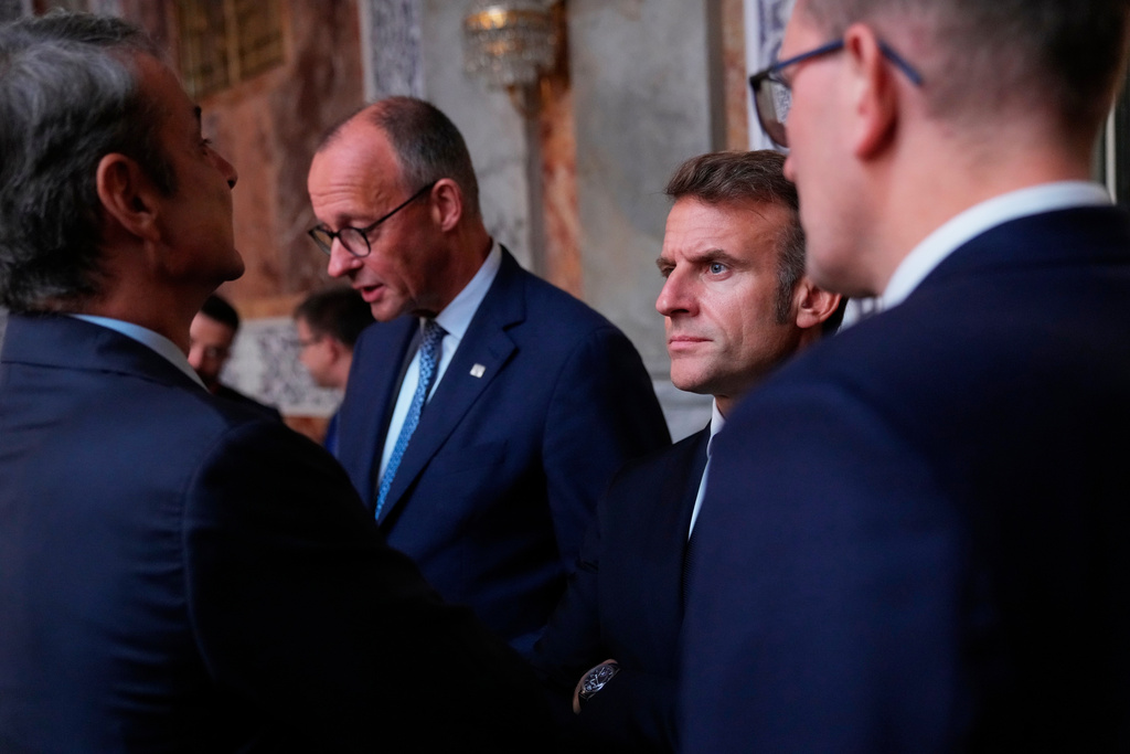 Germany's Chancellor Friedrich Merz and France's President Emmanuel Macron prior to an informal summit in the Danish parliament at Christiansborg Castle in Copenhagen, on Wednesday, Oct. 1, 2025.