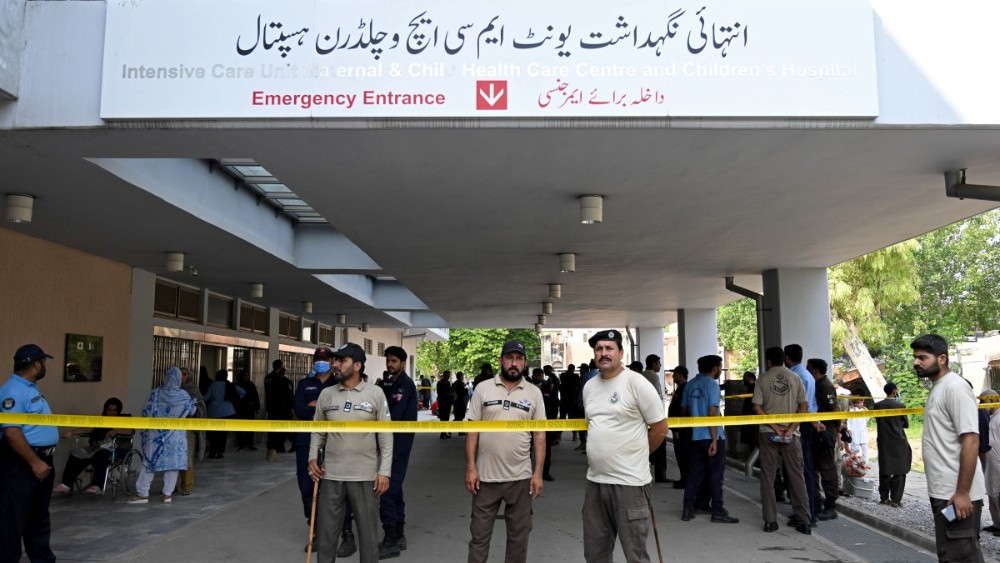 AFP__20260826__C6HK39E__v1__MidRes__PakistanHospitalFire.jpg