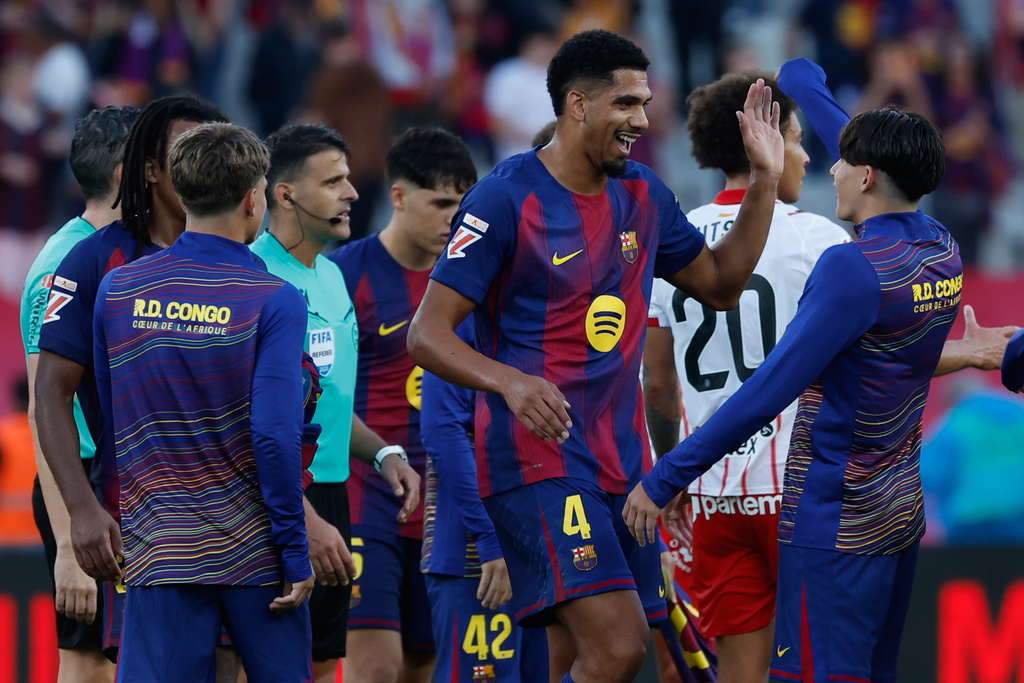 Araujo strikes late as Barca snatch win over Girona